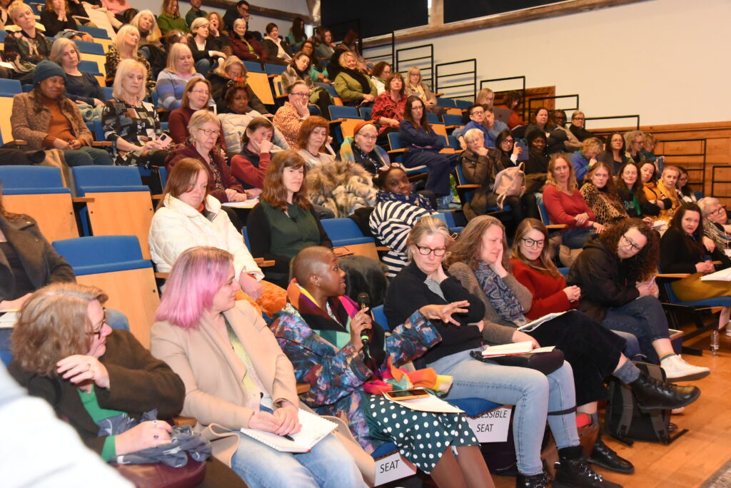 Audience members in auditorium